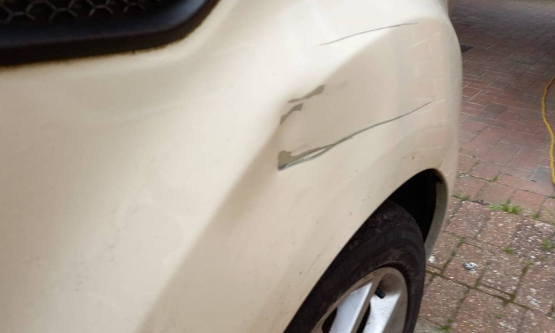 car bodywork damage before insurance repair