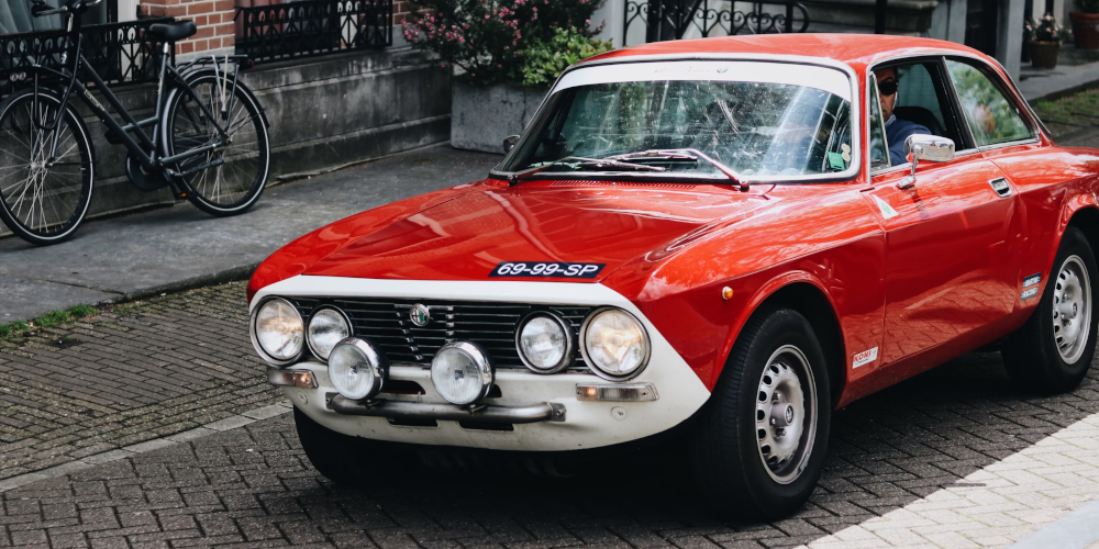 Stylised photograph of the front of a vintage car