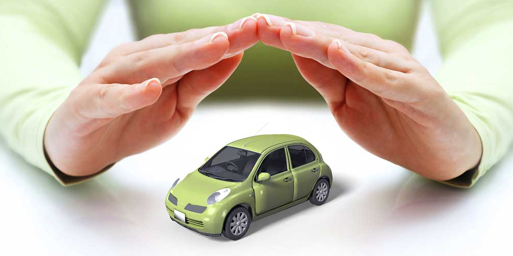 Man holding hands over toy car